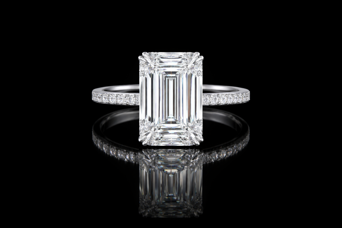 Emerald Cut Hidden Halo Ring 10.46 CTW | Restivo Jewelers