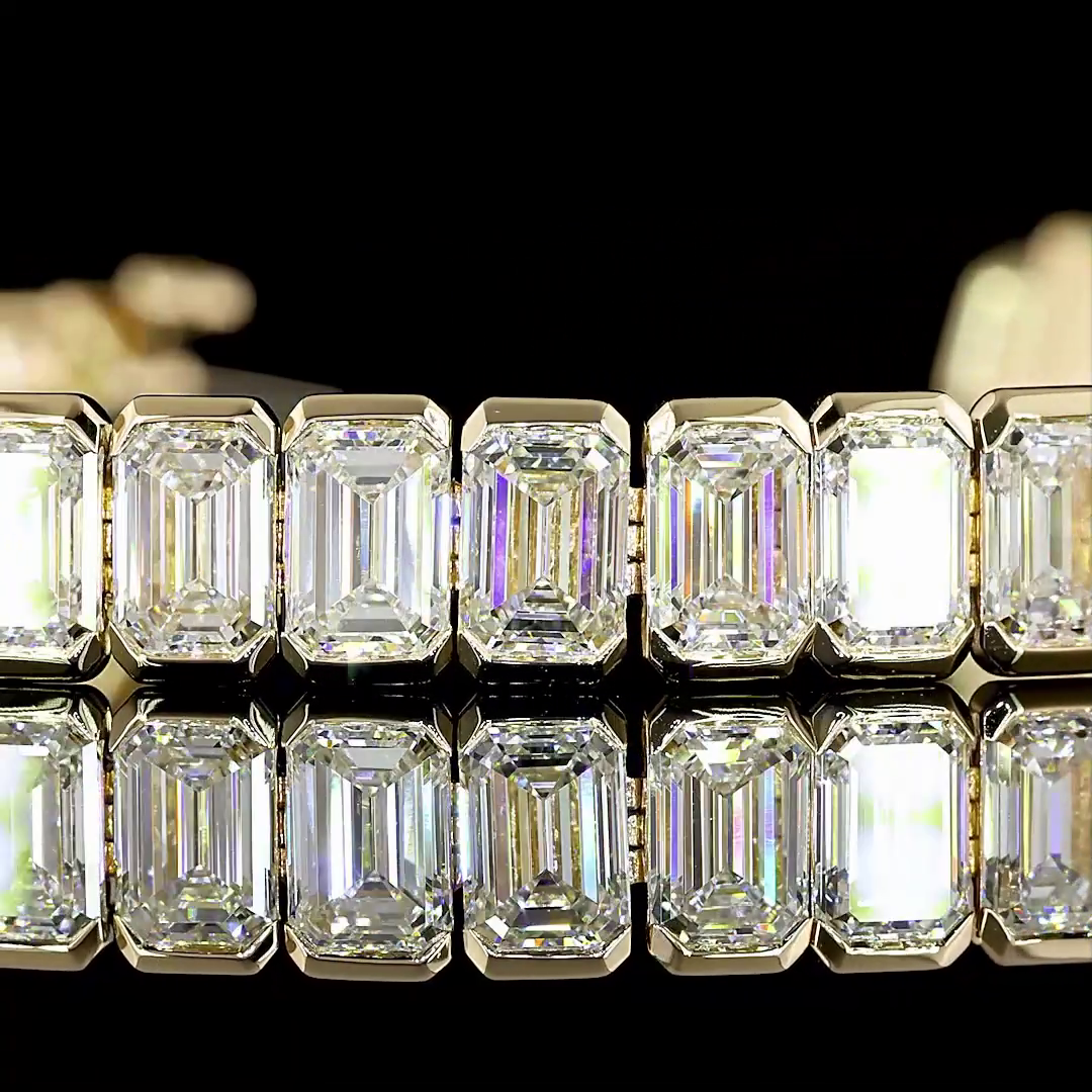 Emerald Cut Half Bezel Tennis Bracelet 20.5 CT | Restivo Jewelers