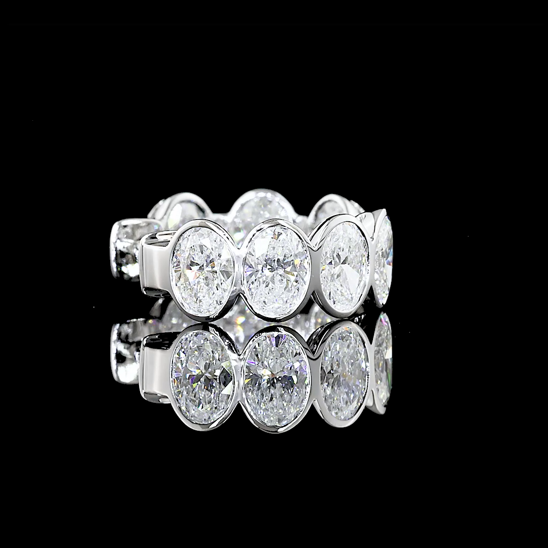 14K Oval Cut Bezel Mini Hoops | Restivo Jewelers