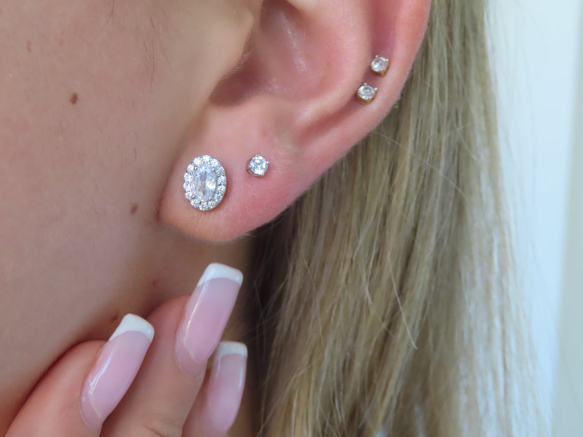 Oval Halo Studs | Restivo Jewelers