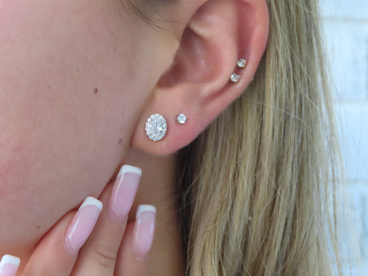 Oval Halo Studs | Restivo Jewelers